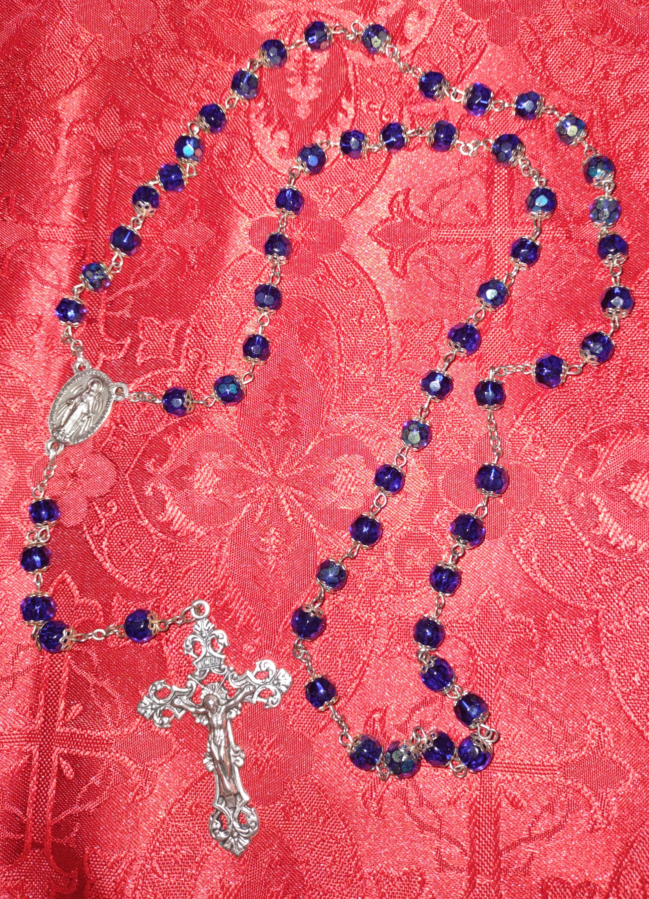 redbackdropbluerosary redbackdropbluerosary